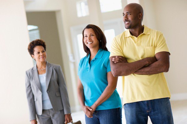 Mortgage Applications Today: Home Loan Demand Rebounds After Rates Hit Lowest Level in Over a Year 1 Couple house-hunting with Realtor