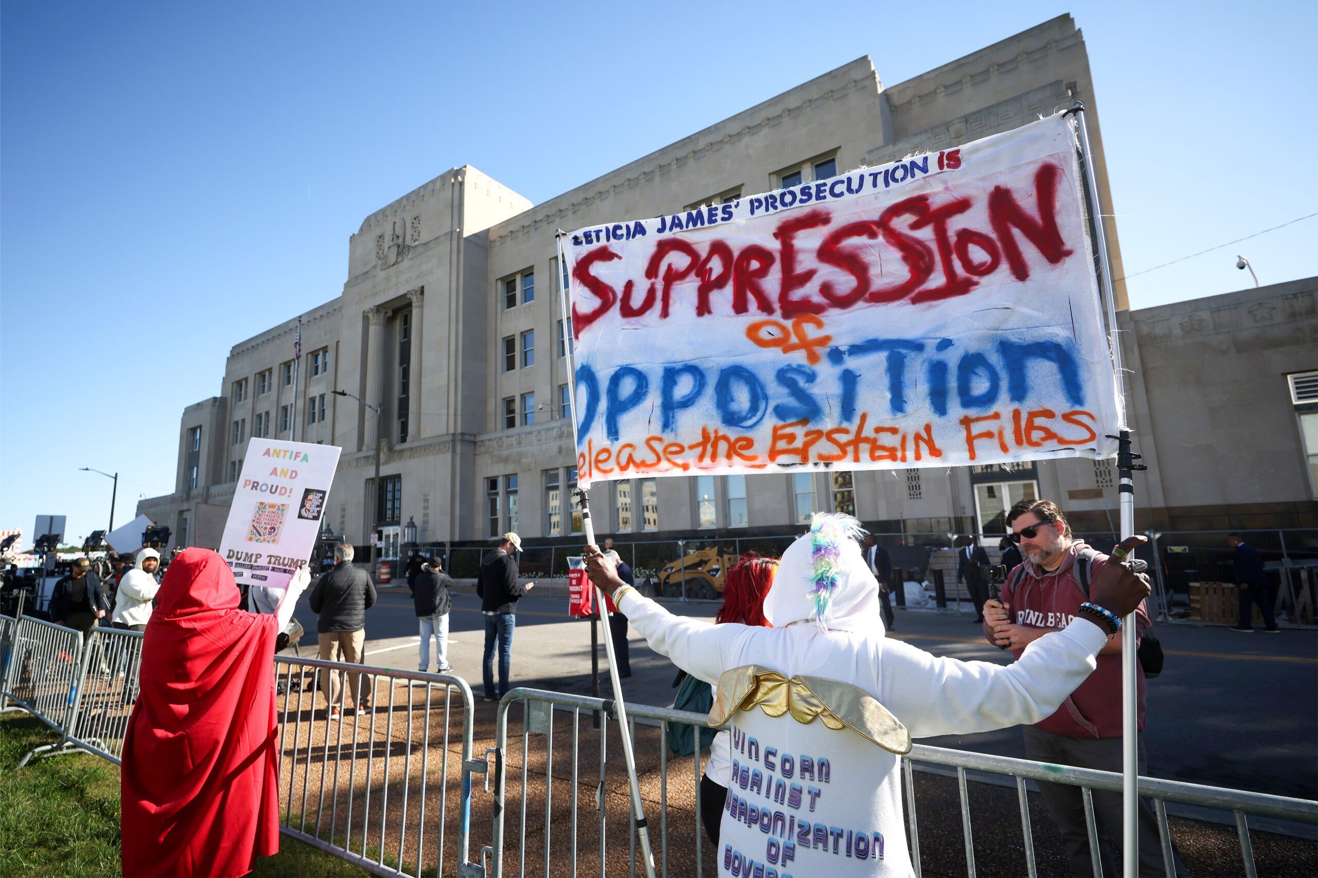 NY Attorney General Letitia James Set To Be Arraigned on Federal Fraud Charges 13 Protester in support of New York Attorney General Letitia James with a sign that says 'Letitia James' prosecution is suppression of opposition' 'release the epstein files'
