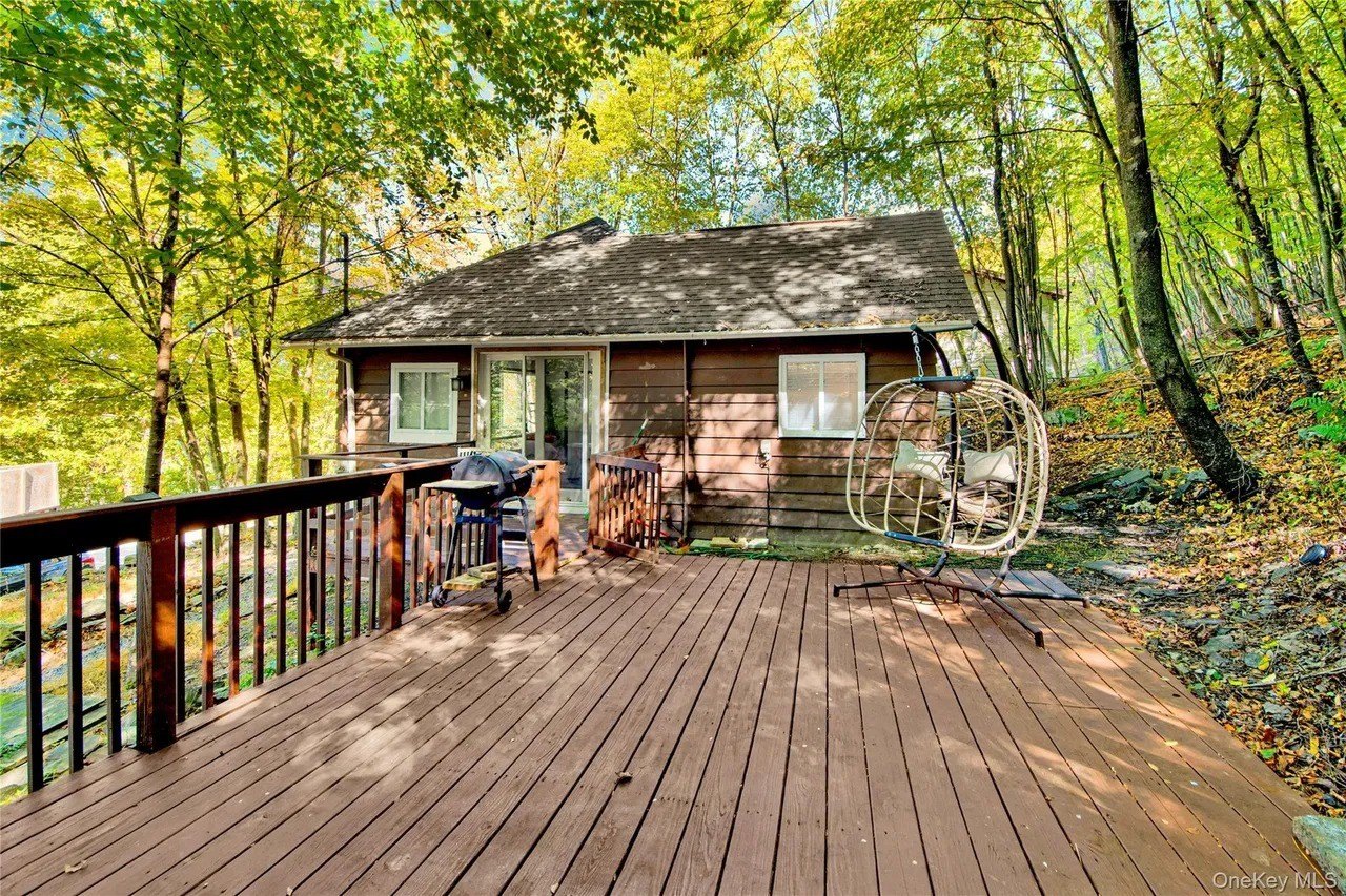 Home 44 Going, Going, Gone? Another Cape Cod Cottage That Sits Mere Feet From the Edge of Crumbling Ocean Bluff Lists for Less Than $200K
